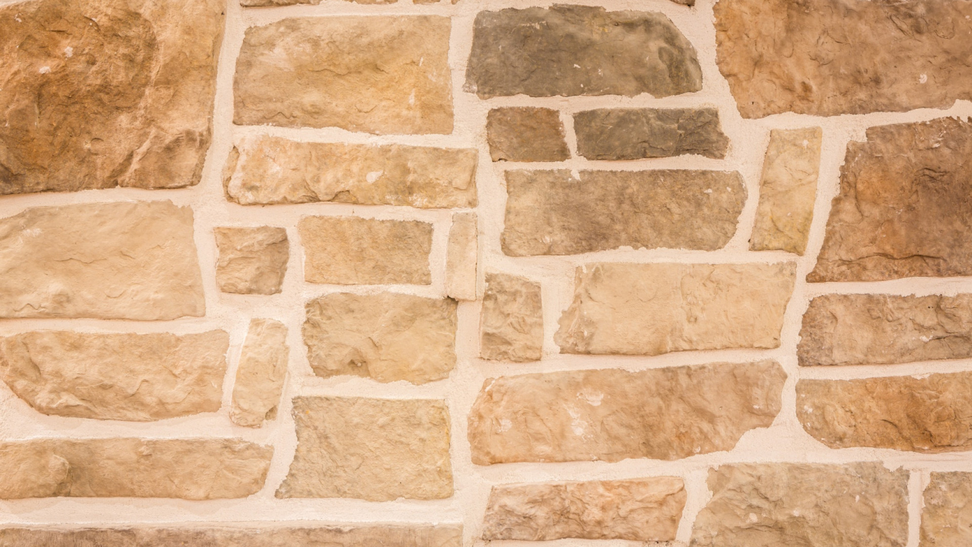 Protégez et embellissez votre façade avec notre enduit en pierre de qualité